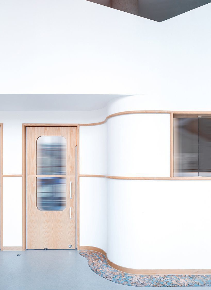 弧形大理石過道裝修設(shè)計兒童機(jī)構(gòu)設(shè)計效果圖