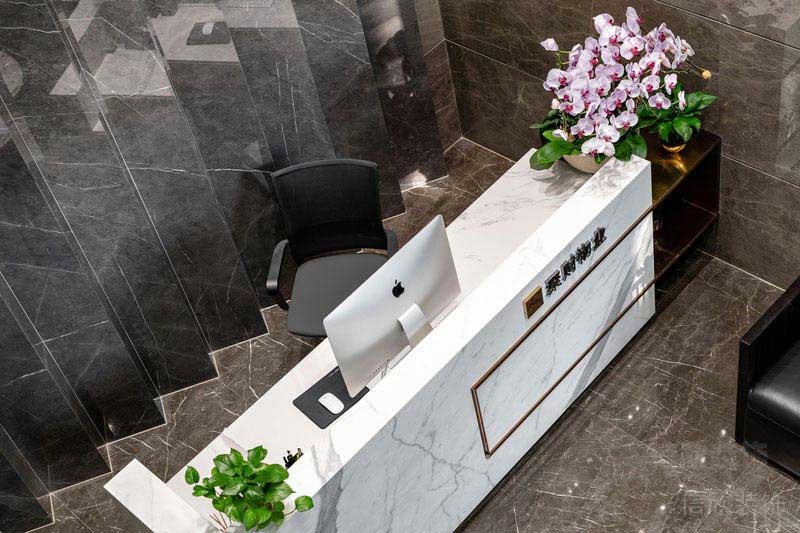 辦公室現(xiàn)代風大理石背景墻前臺效果圖