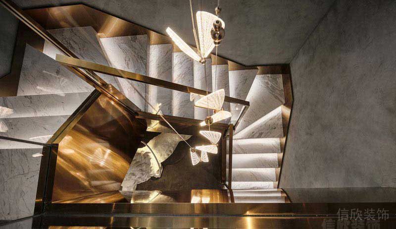 辦公室現(xiàn)代輕奢風石材樓梯香檳金扶手效果圖