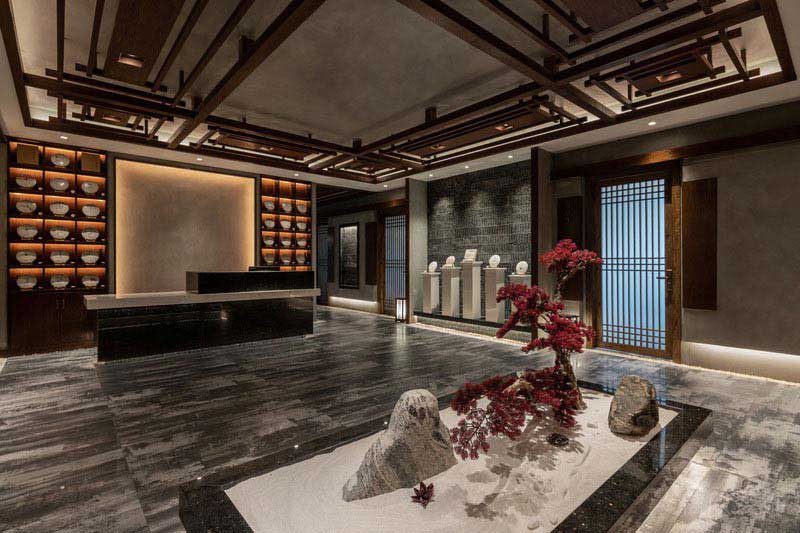 餐廳大廳待客區(qū)前臺(tái)形象版收納墻柜裝修中式風(fēng)灰黑色地面的中式設(shè)計(jì)效果