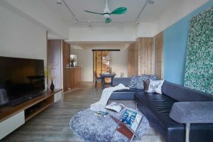 北歐風皮革沙發(fā)圓形地毯木質(zhì)地面電視柜裝修效果圖