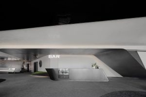 深圳福田卓越城現(xiàn)代風(fēng)格辦公室裝修設(shè)計(jì)前廳吧臺(tái)洽談區(qū)效果圖