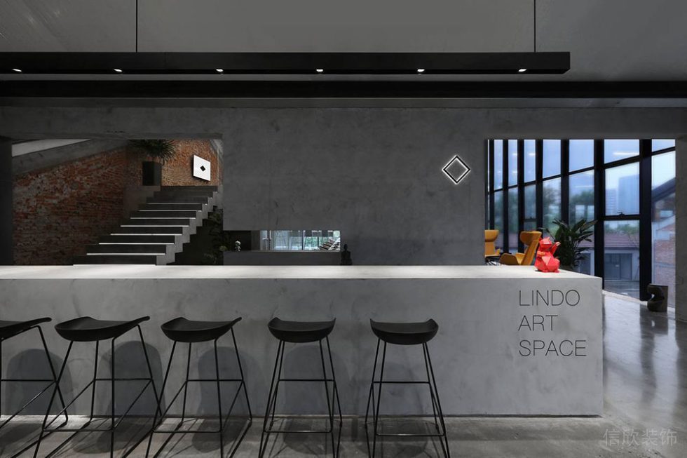 工業(yè)風(fēng)商務(wù)辦公空間吧臺洽談交流區(qū)裝修圖