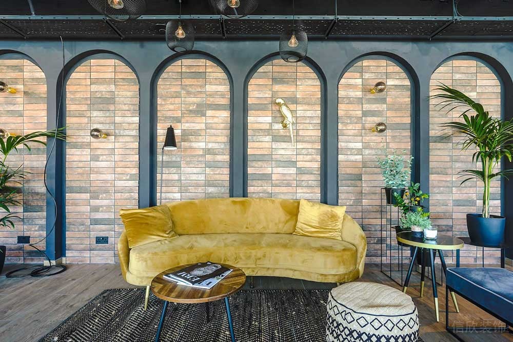 簡(jiǎn)約工業(yè)風(fēng)辦公空間案例員工休閑交流區(qū)裝修圖