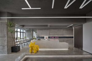 工業(yè)風(fēng)地臺燈飾環(huán)形設(shè)計石材創(chuàng)意休息區(qū)辦公室前臺區(qū)域效果圖