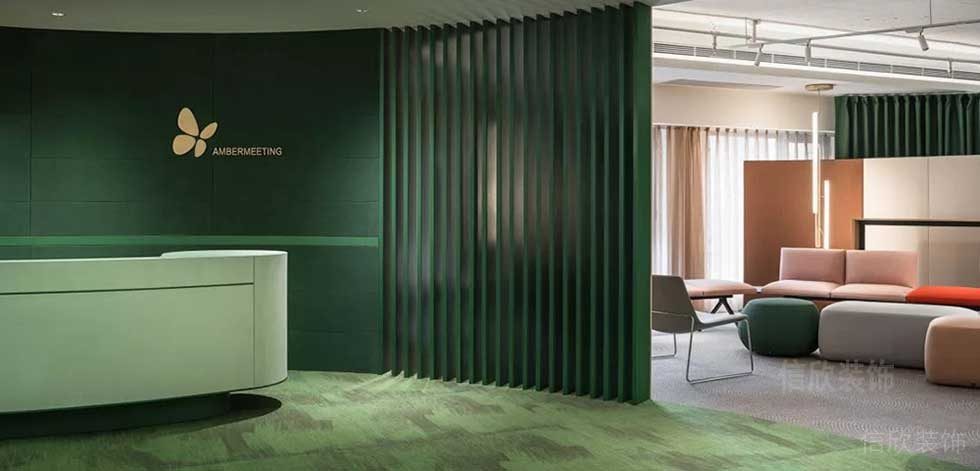 簡(jiǎn)約風(fēng)格辦公室前臺(tái)綠色背景墻裝修圖