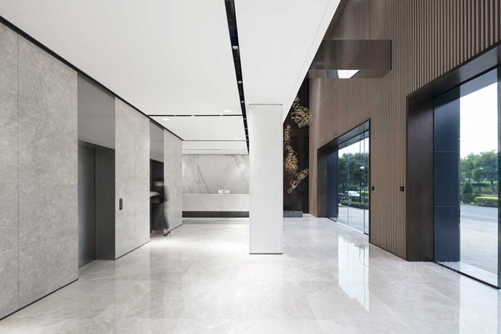 大理石地板電梯等候區(qū)域裝修木質(zhì)玻璃智能門(mén)辦公室大廳效果圖