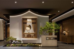 深圳寶安新中式風(fēng)格渝派川菜餐廳裝修設(shè)計前廳綠植水景效果圖