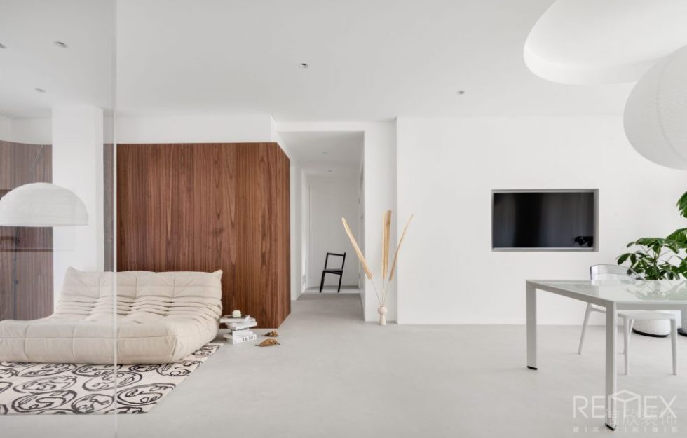 木飾面背景墻休息區(qū)圓形吊頂裝修設(shè)計