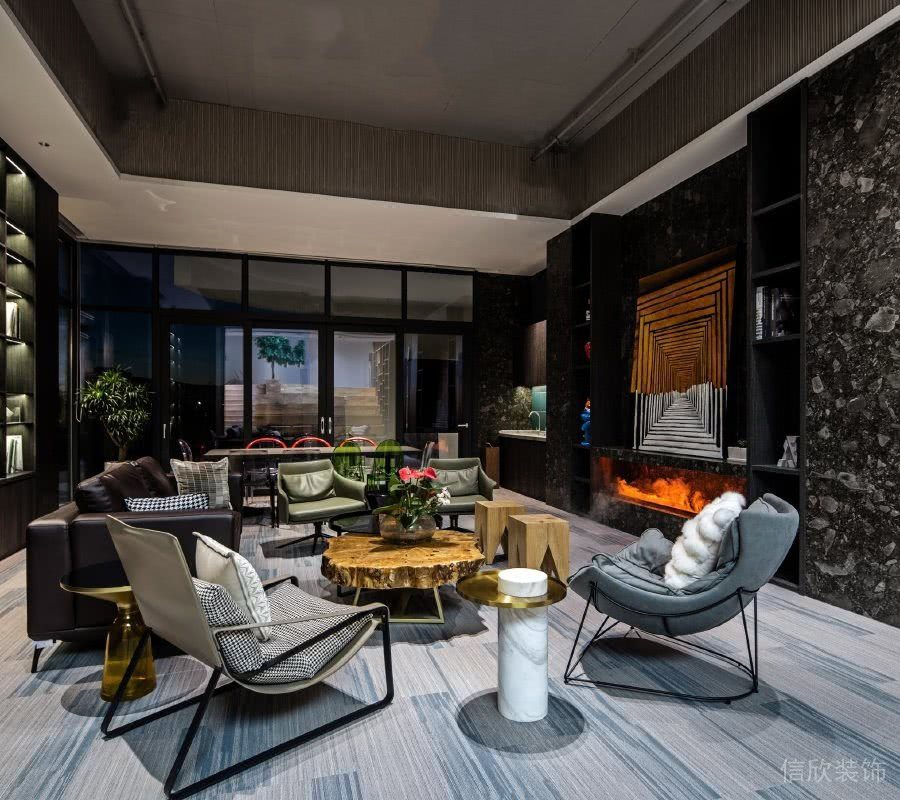 公司休息區(qū)沙發(fā)種類裝修設(shè)計加濕器墻體金屬黑色玻璃隔斷效果