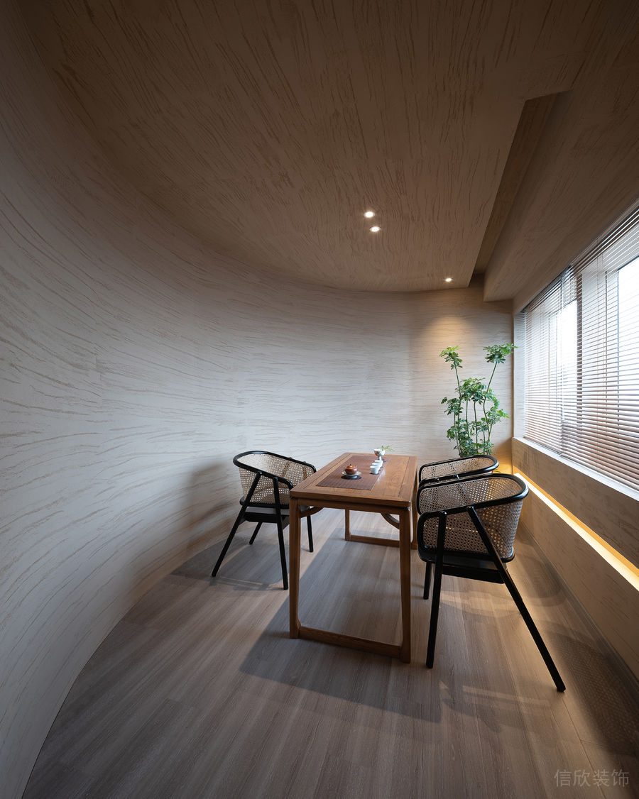 深圳寶安中洲華府暖色調(diào)極簡風格茶館裝修案例弧形墻面特色三人包廂