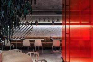 深圳龍崗百合山莊工業(yè)風(fēng)披薩店裝修案例卡座效果圖