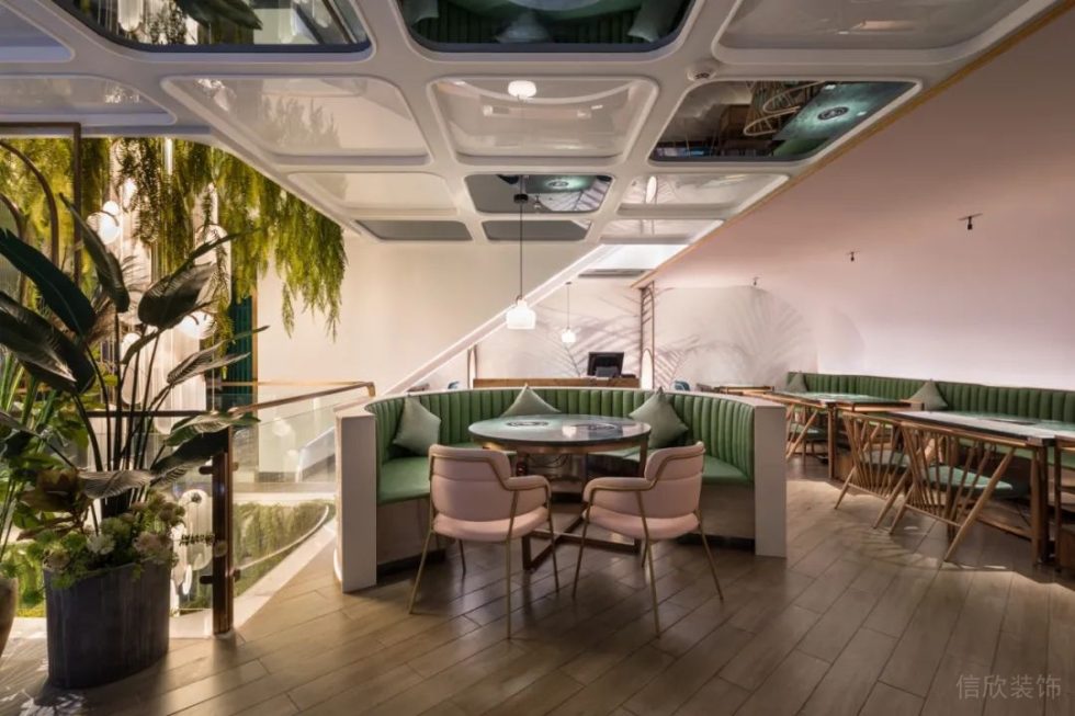 深圳南山方大城北歐輕奢風(fēng)海鮮火鍋餐廳裝修案例卡座效果圖