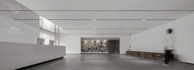 白色主調(diào)現(xiàn)代極簡主義風格辦公室裝修設(shè)計 前臺區(qū)域側(cè)面圖