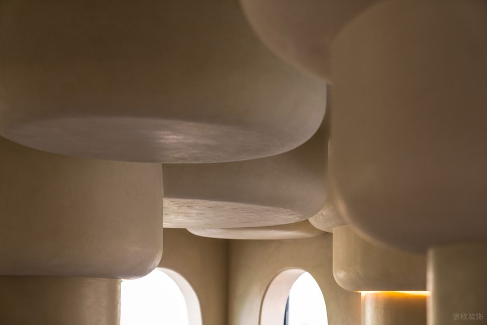 深圳南山洞穴造型餐廳圓潤吊頂裝修設(shè)計(jì)