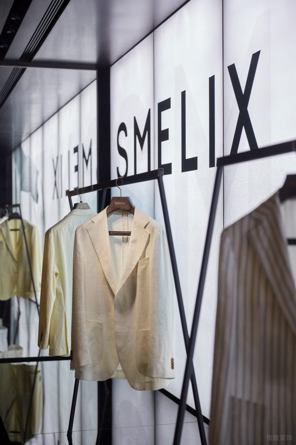 深圳市寶安區(qū)石巖smelix仕覓男裝高定店裝修設(shè)計-實木輕奢大廳三 深圳市寶安區(qū)石巖smelix仕覓男裝高定店裝修設(shè)計-實木輕奢大廳三