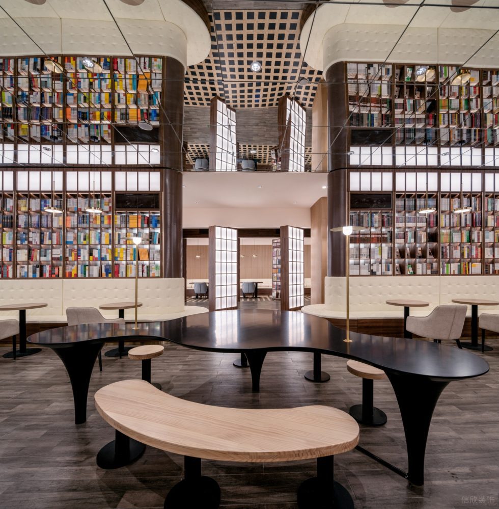 深圳市羅湖區(qū)寶安南新中式風(fēng)書店裝修設(shè)計-實木弧形桌椅閱讀區(qū) 深圳市羅湖區(qū)寶安南新中式風(fēng)書店裝修設(shè)計-實木弧形桌椅閱讀區(qū)