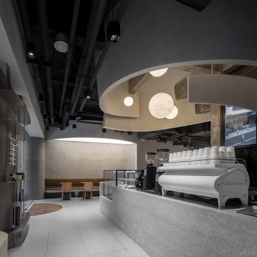 工業(yè)簡(jiǎn)約風(fēng)咖啡店入口吧臺(tái)區(qū)裝修實(shí)景圖