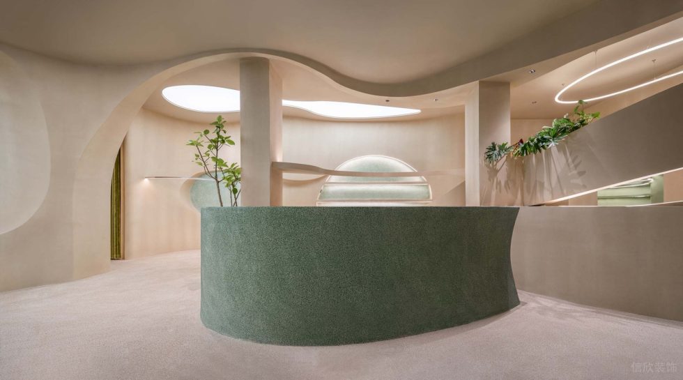 綠意奶油簡約風(fēng)飲品店杏色空間的綠色前臺效果圖