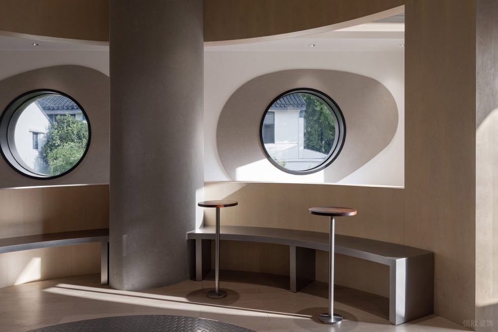 原木工業(yè)簡(jiǎn)約風(fēng)飲品店圓形窗洞裝修設(shè)計(jì)