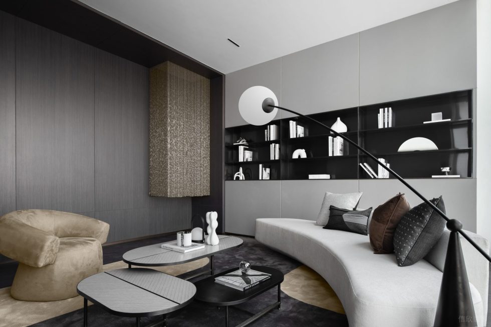 簡約低奢風(fēng)城市文化展廳裝修方案 灰色弧形沙發(fā)黑色入墻式柜子