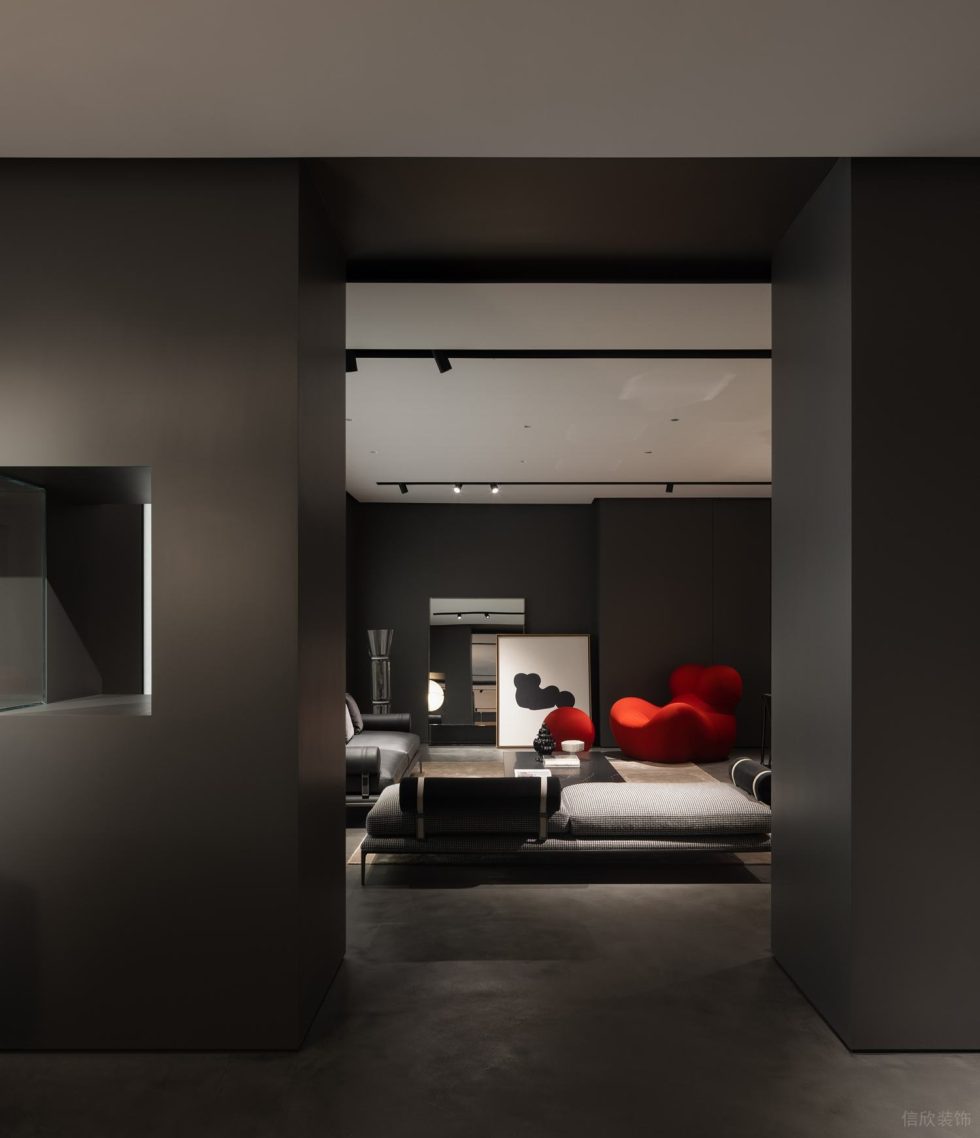 沙頭角現(xiàn)代簡約風(fēng)展廳裝修案例 灰色沙發(fā)紅色卡通大椅子