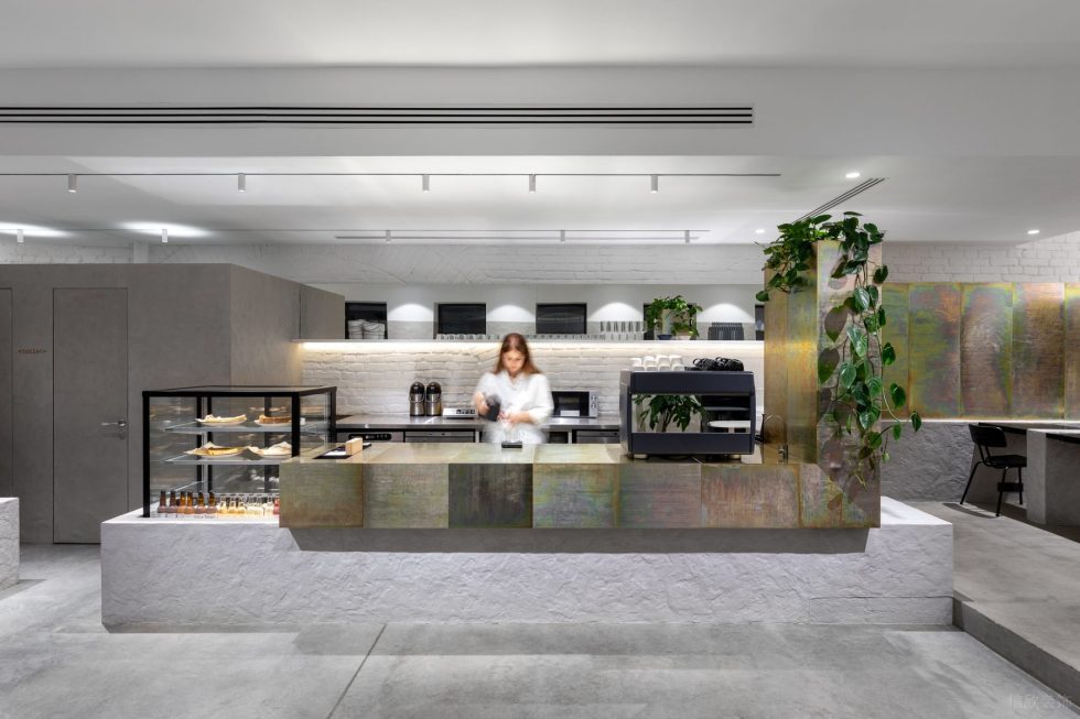 現(xiàn)代極簡(jiǎn)風(fēng)咖啡廳多彩鐳射搭白面墻體操作臺(tái)設(shè)計(jì)示意圖