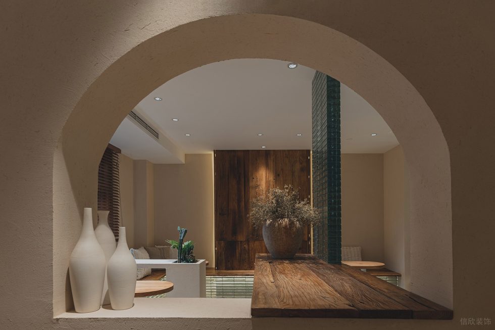 原木奶油風(fēng)咖啡廳弧形墻洞開口設(shè)計(jì)圖