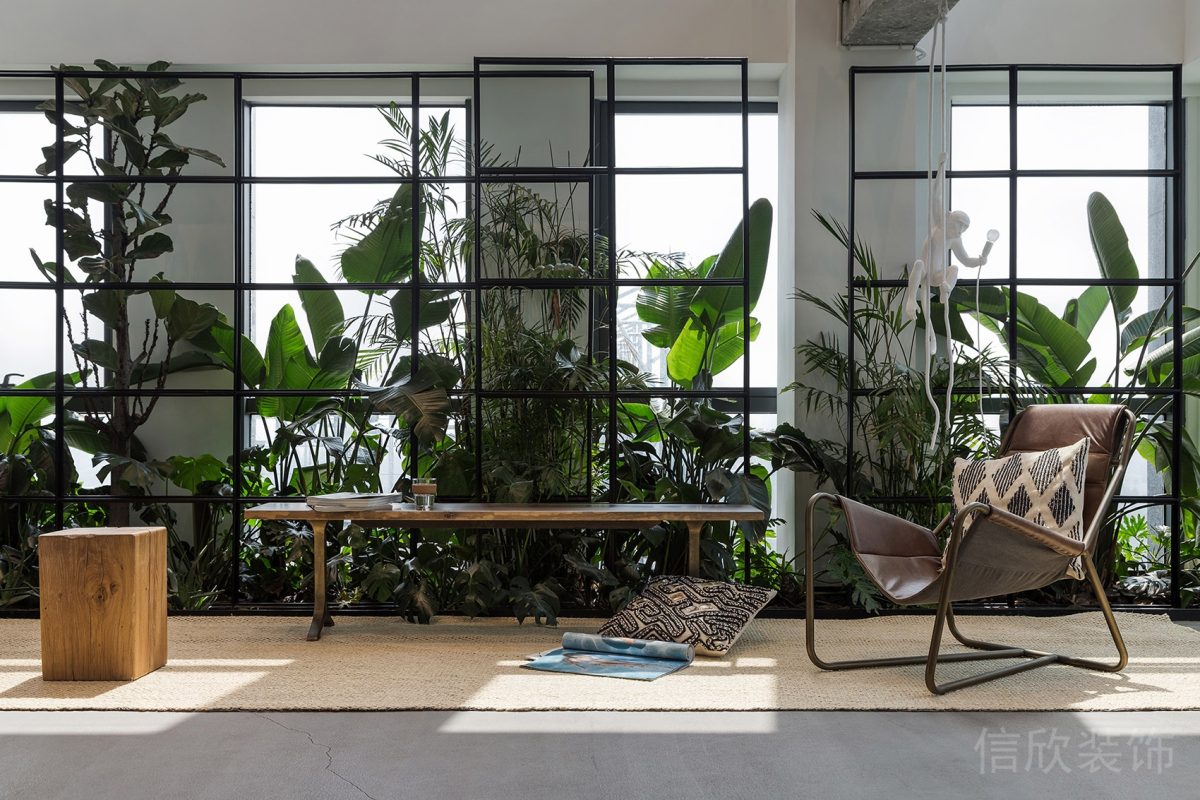 綠色金屬鏤空玻璃墻體設(shè)計裝修茶幾休息區(qū)裝修圖