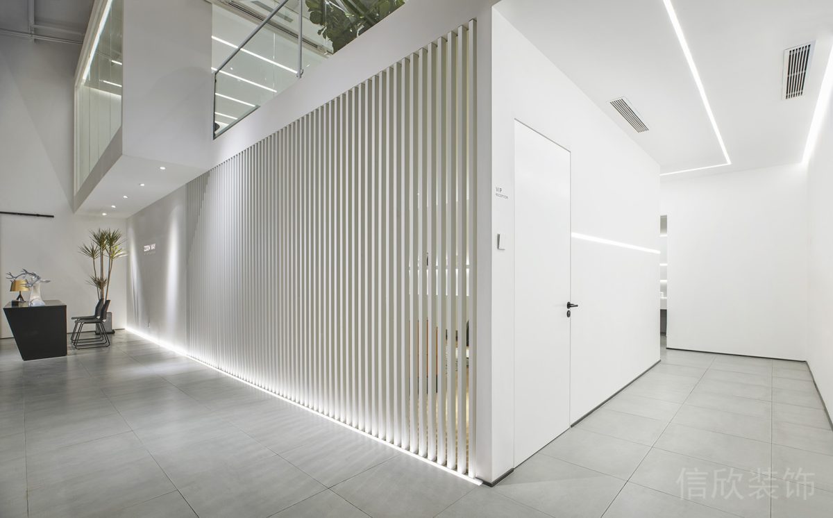 現(xiàn)代簡約風(fēng)辦公室裝修設(shè)計(jì)鏤空白色拐角裝修