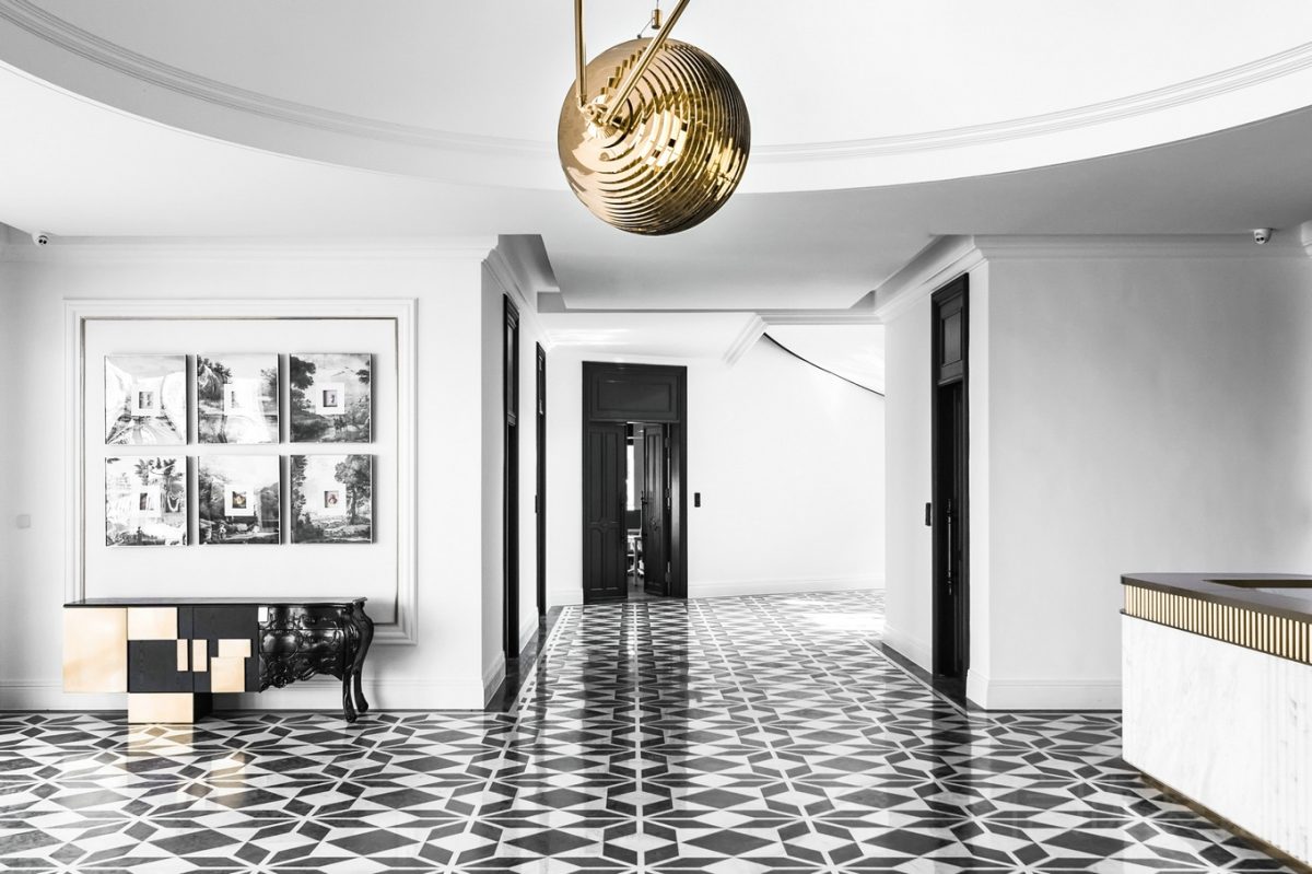 棋盤格辦公室裝修設(shè)計(jì)黑白色調(diào)經(jīng)典色彩效果鎏金燈飾設(shè)計(jì)圖